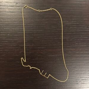 Gold letter “E” necklace
